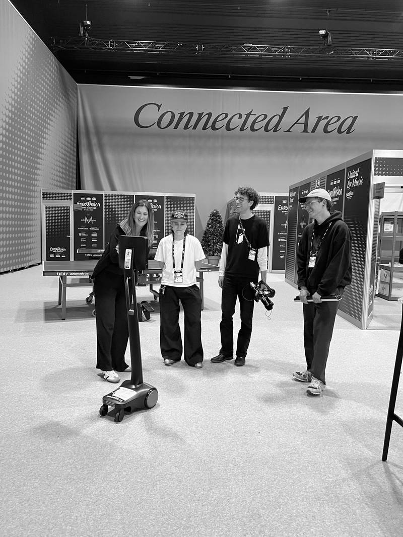 Cast students interact with a mobile screen backstage at ESC. At the wall it says: "Connected Area". Credits: Nadia Holdener.