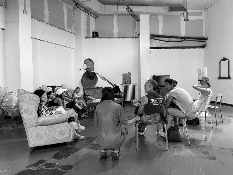 The Summer School group in conversation with founding members of Spin Time, a self-organized housing and community project in Rome (Photo: Marcel Bleuler).