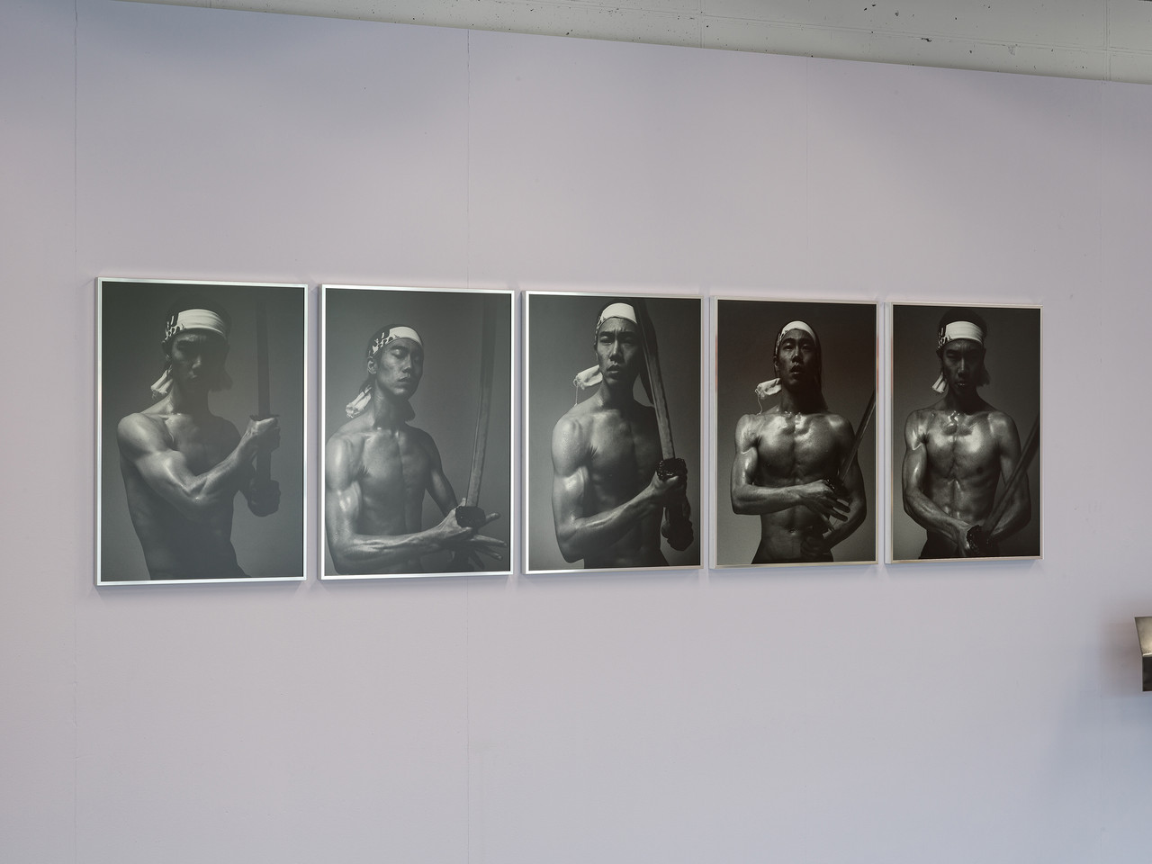 (left to right) Summer Practice, 2026 Inkjet print on archival paper, framed, 5 parts: each 70 x 50 cm Minimal Treatment on Excess Surface, 2026 Steel plate, camellia oil, wood, color lacquer, 25 × 400 × 25 cm