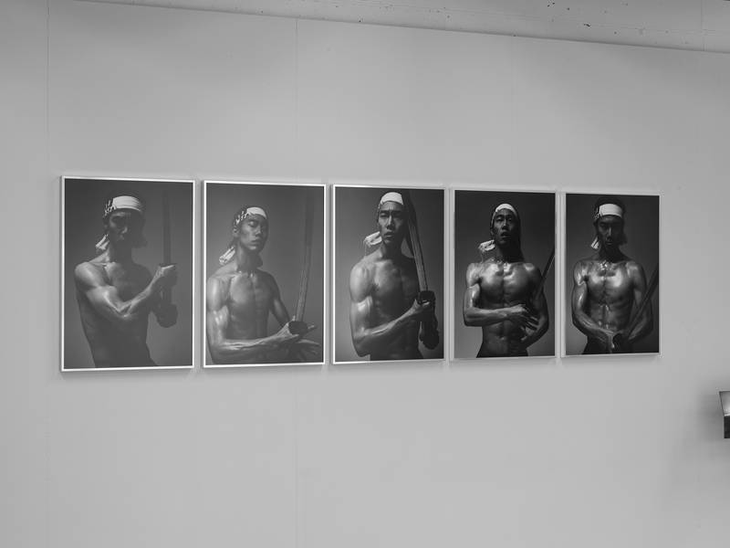 (left to right) Summer Practice, 2026 Inkjet print on archival paper, framed, 5 parts: each 70 x 50 cm Minimal Treatment on Excess Surface, 2026 Steel plate, camellia oil, wood, color lacquer, 25 × 400 × 25 cm