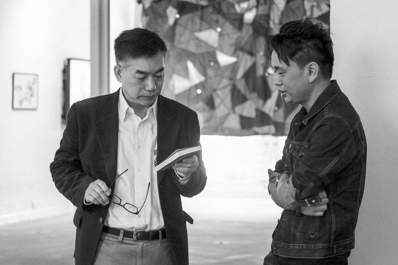 Co-Curator Desmond Hui talking to Simon Shen – Panelist on “The Digital” and director of Global Studies Program at The Chinese University of Hong Kong