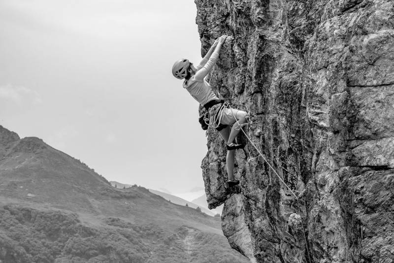 Livia climbing with hooq shoes, 2024. Image: © Nicole Maag